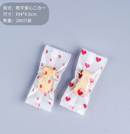 LBSISI Life 200Pcs Nougat Sugar Plastic Bags Peanut Candy Wrappers Handmade Candy Wrapping Bakery Decoration Packaging 4*9.5cm